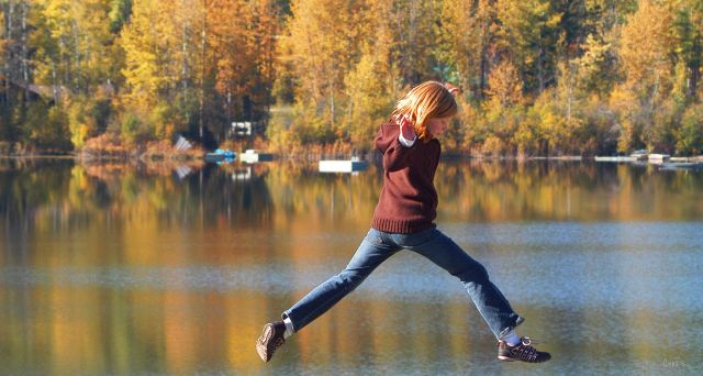 girl jumping autumn lake redhead DSC_0379